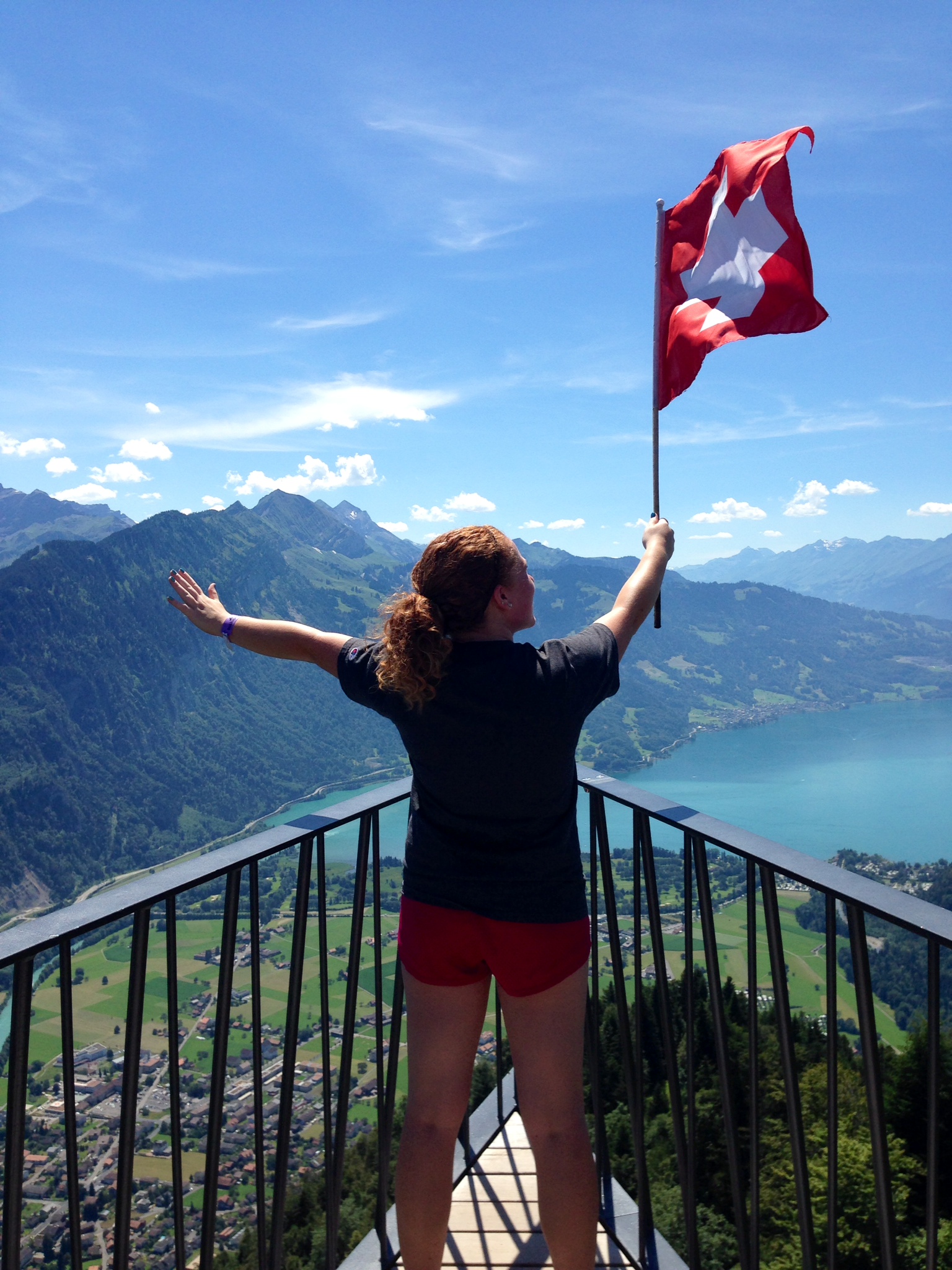Student waving flag